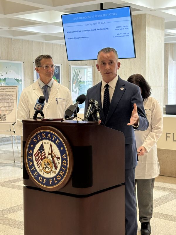 Democratic gubernatorial candidate David Jolly with Dr. Jay Epstein to his right, at the Florida Capitol April 28, 2026 to discuss Republican-led efforts to roll back vaccine requirements