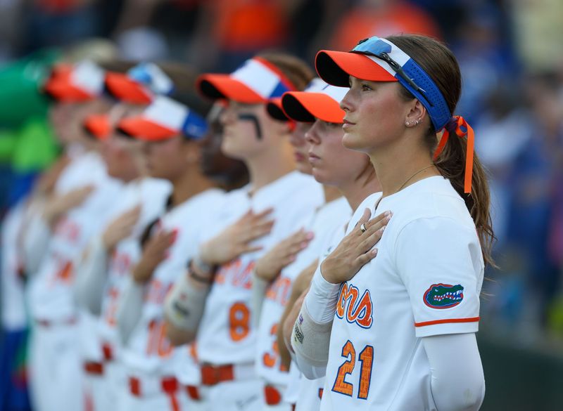 Florida honors the flag during a NCAA softball game at Katie Seashole Pressly Stadium in Gainesville, FL on Tuesday, April 28, 2026. [Alan Youngblood/Gainesville Sun]