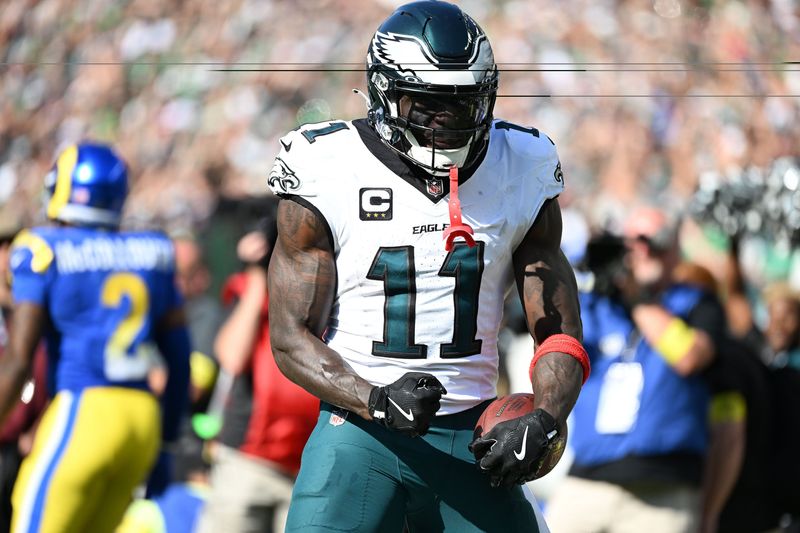 Sep 21, 2025; Philadelphia, Pennsylvania, USA; Philadelphia Eagles wide receiver AJ. Brown (11) reacts against the Los Angeles Rams during the second half at Lincoln Financial Field. Mandatory Credit: Eric Hartline-Imagn Images