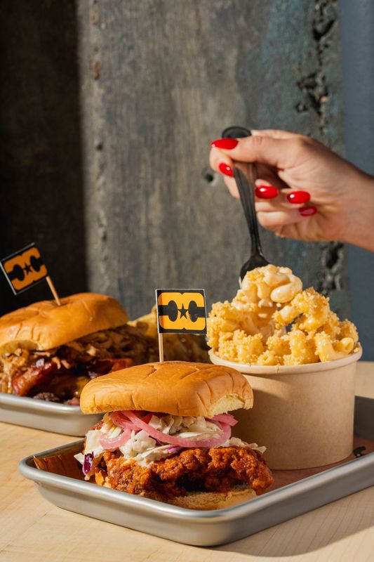 Topped with coleslaw, pickled red onion and howdy heat sauce, the Florida Hot Chicken sandwich at West Palm Cowboy Club aims to please.