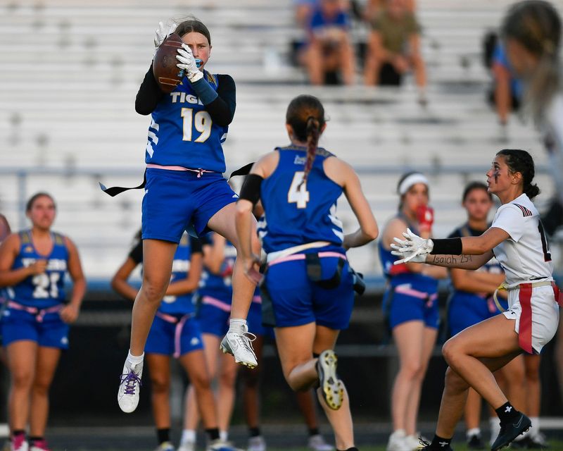 Martin County's Tess Addeo (19) makes a catch in a Region 2-3A flag football quarterfinal against South Fork on April 29, 2026, at Martin County High School. South Fork won 7-0.