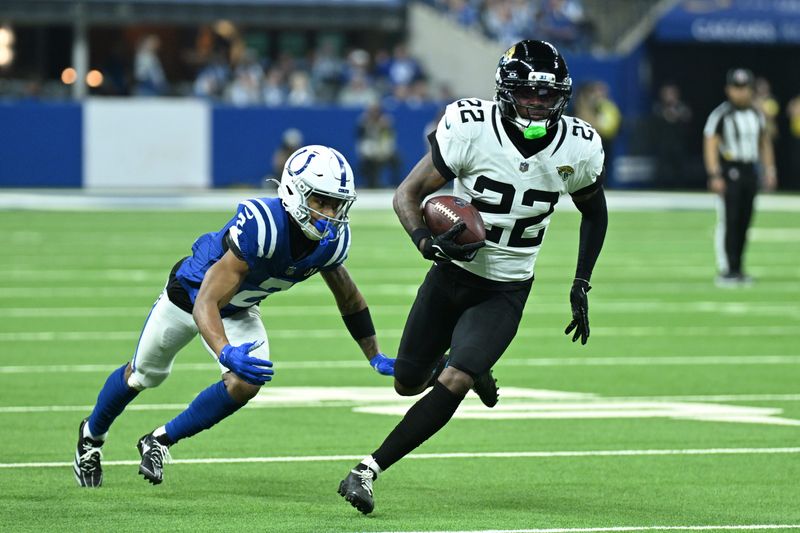 Dec 28, 2025; Indianapolis, Indiana, USA; Jacksonville Jaguars cornerback Jarrian Jones (22) runs against Indianapolis Colts wide receiver Josh Downs (2) during the second half at Lucas Oil Stadium. Mandatory Credit: Robert Goddin-Imagn Images