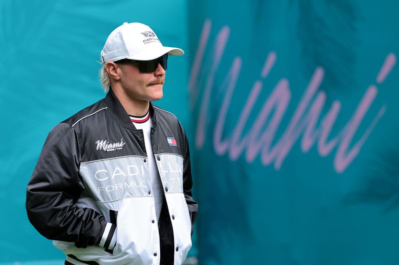 Apr 30, 2026; Miami Gardens, FL, USA; Cadillac driver Valtteri Bottas (77) arrives to the paddock area at Miami International Autodrome. Mandatory Credit: Sam Navarro-Imagn Images