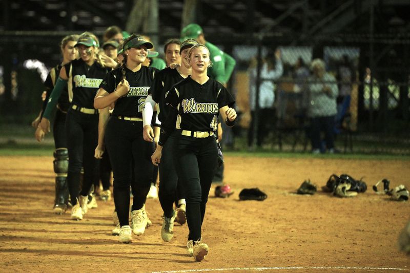 Jupiter's softball team makes takes the winners walk after an 8-4 district championship victory against Wellington on April 29, 2026.