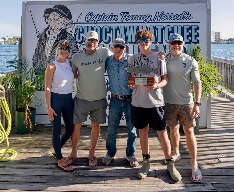 Nick and Parker won the first-ever Tommy Norred's Choctawhatchee Challenge with 25 points for eight fish caught. Standing from left are Rachel Sharp of Harbor Docks, Nick Martin, Tommy Norred, Parker Martin, and Eddie Morgan, tournament director.