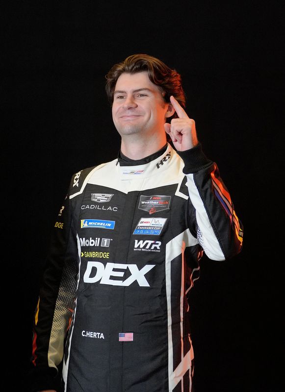 Colton Herta with Cadillac Wayne Racing team poses for photographs during IMSA Media Day, Thursday, Jan. 15, 2026 in the Daytona 500 club at Daytona International Speedway.