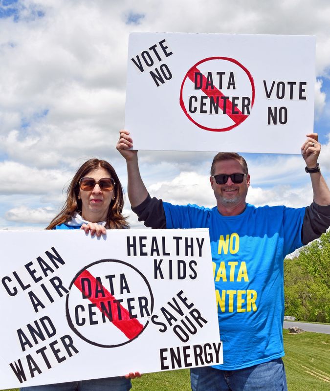 More than 55 protesters stood along Route 422 Saturday, May 2, raising opposition against a proposed $1.7 billion data center by 1235 Martina Drive Owner LLC in South Annville Township.