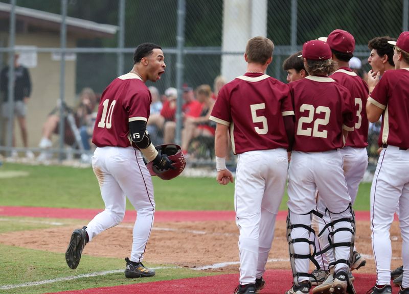 North Marion Trenton Ramsey (10) celebrates a homer during the 2026 FHSAA Baseball State Championships 3A Semifinal against South Sumter Saturday, May 2, 2026, in Sparr, [Alan Youngblood/Gainesville Sun]