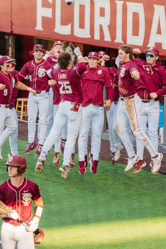 Hunter Carnes celebrates with his teammates in the dugout after hitting a home run against Pitt on Saturday, May 2, 2026.