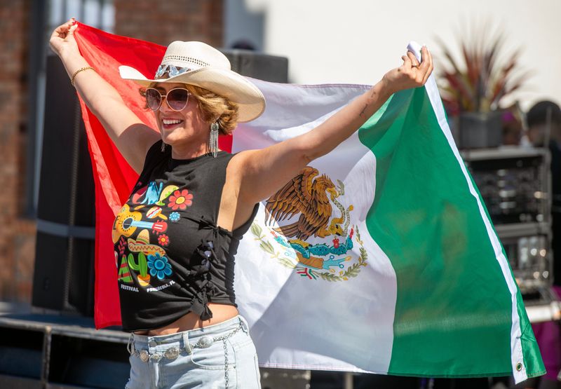 Attendees take in the festivities during the Cinco de Mayo celebration at Seville Quater Sunday, Mat 3, 2026. The celebration included live music, food, ,cultural performances, dancing and more.