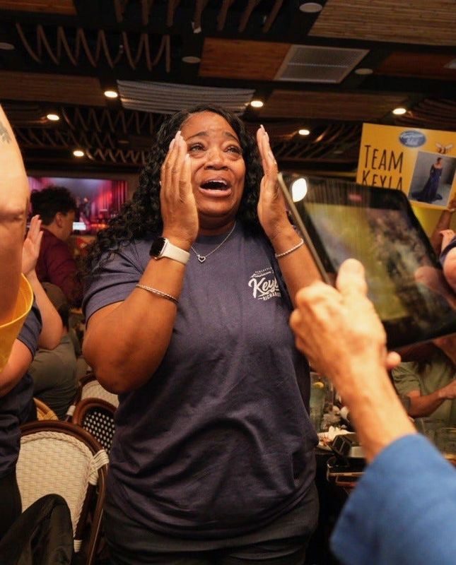 Keyla Richardson’s mother, Katja Richardson, reacts as 'American Idol' judges announce Keyla made the show's Top 3 finale Monday night. Katja joined family and "Keyhive" fans at Margarita's Fusion & Bar.