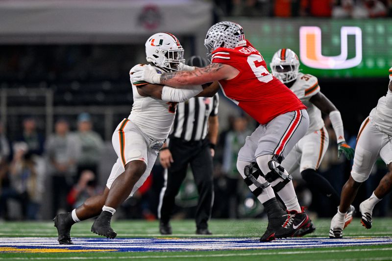 Dec 31, 2025; Arlington, TX, USA; Ohio State Buckeyes offensive lineman Austin Siereveld (67) blocks Miami Hurricanes defensive lineman Rueben Bain Jr. (4) during the 2025 Cotton Bowl and quarterfinal game of the College Football Playoff at AT&T Stadium. Mandatory Credit: Jerome Miron-Imagn Images