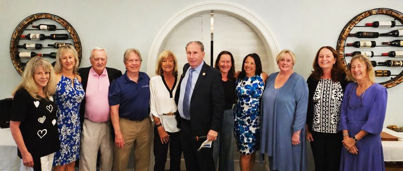 From left, Nan Needlemann, Denise Pancyrz, Bob Thomas, Bill Morris, Deb Shanahan, Neil Snyder, Rahel Schenk, Evelyn Rosetti-Ryan, Rebecca Snyder, Annette Bertelson and Pam Shniper.