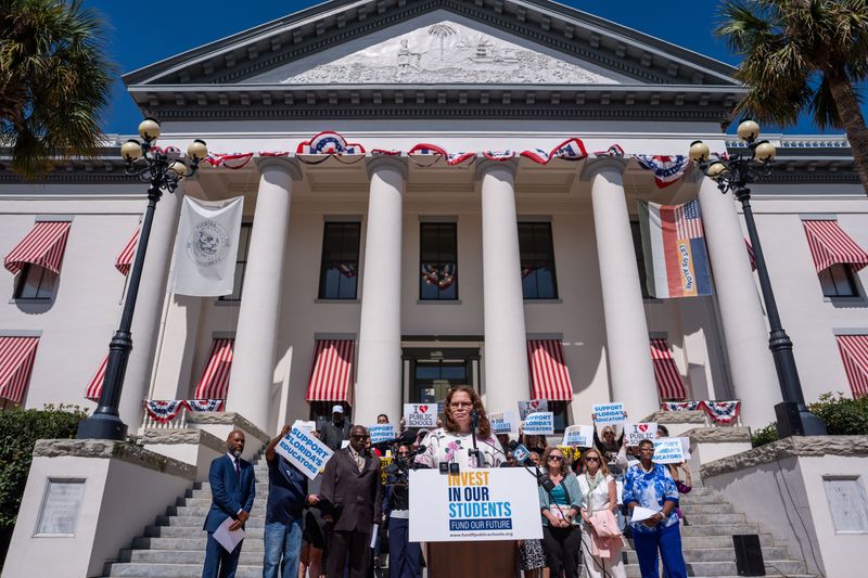 Florida educators, parents and others gather on the steps of the Florida Historic Capitol to voice their opinions for better support of public schools Tuesday, May 5, 2026.