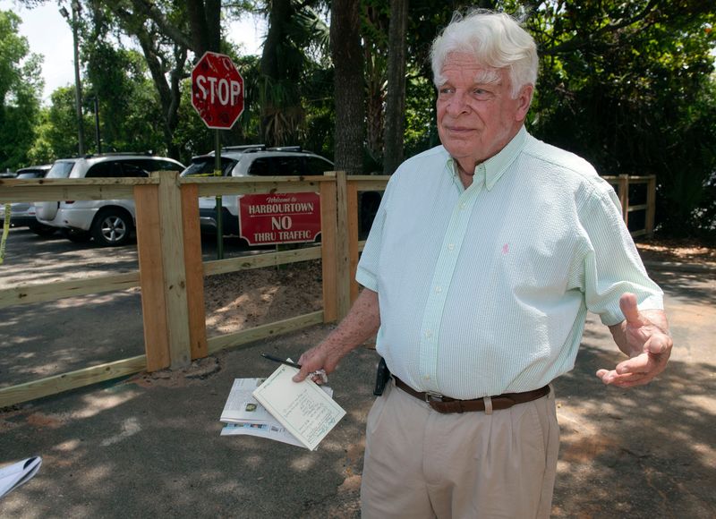 Gulf Breeze property owner Christopher Green has come under fire after building a fence along his property line and denying access to a popular alternative route to the Harbourtown shops. Green began building the fence in late April, but as of May 5, 2026, City of Gulf Breeze officials ordered him to stop construction.