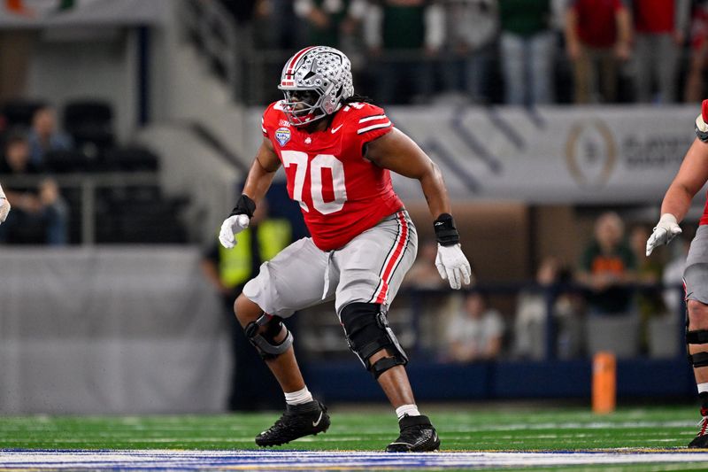 Dec 31, 2025; Arlington, TX, USA; Ohio State Buckeyes offensive lineman Phillip Daniels (70) blocks the rush during the 2025 Cotton Bowl and quarterfinal game of the College Football Playoff at AT&T Stadium. Mandatory Credit: Jerome Miron-Imagn Images