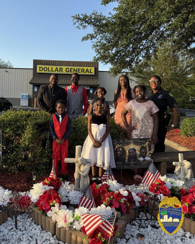 Mary Malcom, a corrections officer with the Jacksonville Sheriff's Office, took the lead with her family to restore the Dollar General victims memorial that recently was destroyed.