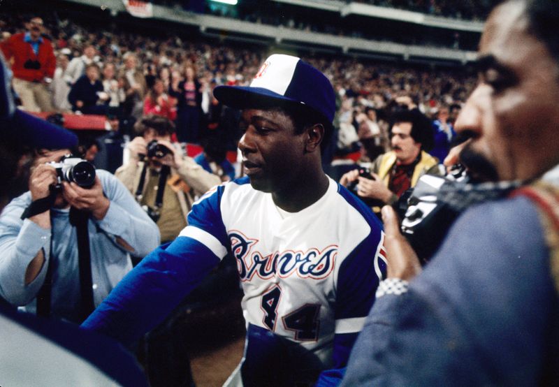 Apr 8, 1974; Atlanta, GA, USA; FILE PHOTO; Atlanta Braves outfielder Hank Aaron (44) after breaking the all-time career home run record previously held by Babe Ruth at Fulton County Stadium against the Los Angeles Dodgers. Mandatory Credit: Manny Rubio-USA TODAY Sports