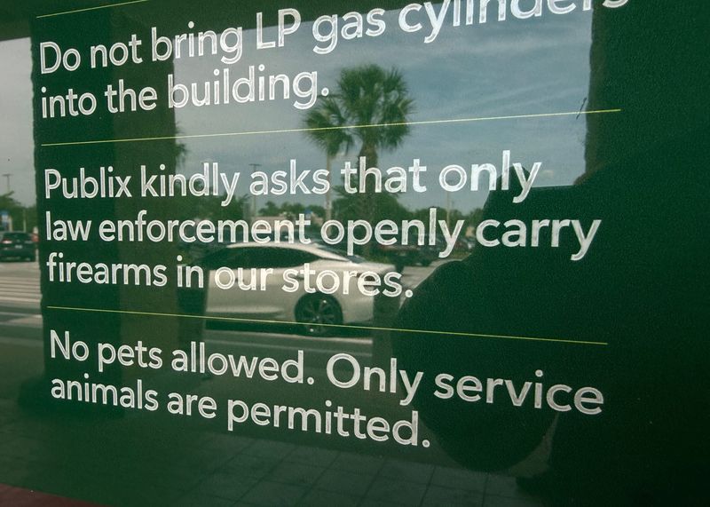 A sign at a Deland Publix asks customers not to bring firearms in the store Wednesday, May 6, 2026.