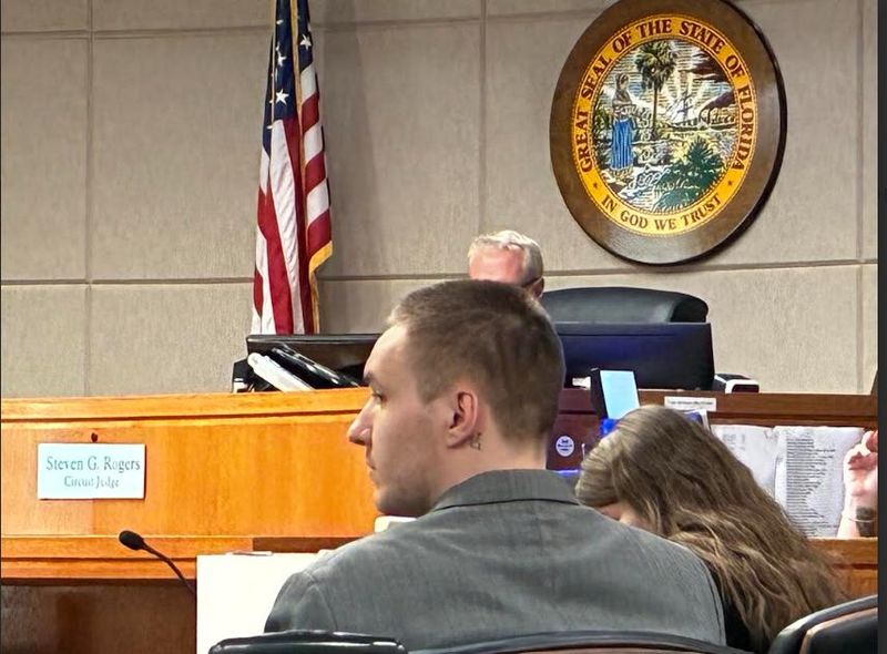 Defendant Christian Patrick Parker listens to his attorney during his vehicular homicide trial on May 6 at the Marion County Judicial Center.