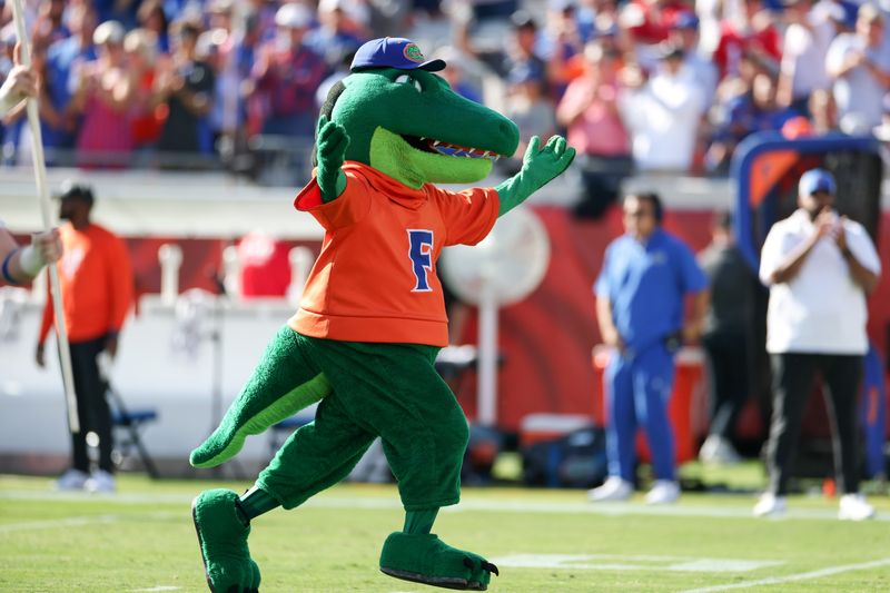 Nov 1, 2025; Jacksonville, Florida, USA; Florida Gators mascot Albert the Alligator runs across the field prior to the game against the Georgia Bulldogs at EverBank Stadium. Mandatory Credit: Matt Pendleton-Imagn Images