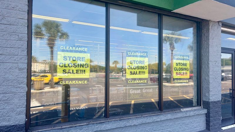 Signs posted in the window of the Harveys Supermarket on West 48th Street in Jacksonville, Fla. show The Winn-Dixie Company's plan for closing the store. The company deferred the planned mid-May closure to have more time to talk with city leaders and residents about the future of the store.