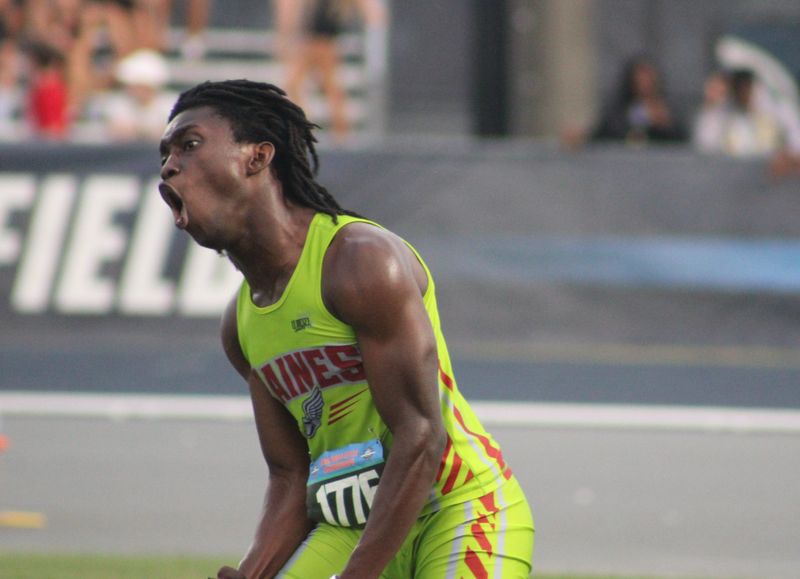 Raines senior Owen Kaye shouts in celebration upon learning that he just won the boys 200-meter dash, and with it the boys team championship, during the FHSAA Class 2A high school track and field championships on May 7, 2026. [Clayton Freeman/Florida Times-Union]