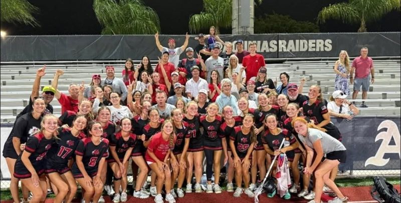 The Vero Beach girls lacrosse team celebrates after defeating St. Thomas Aquinas 8-3 during the Region 4-2A Final on Saturday, May 2, from Fort Lauderdale