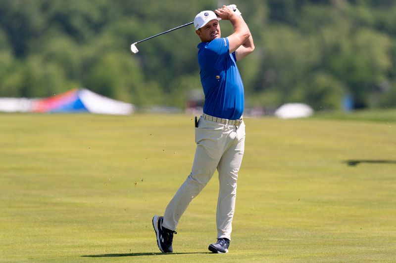 May 7, 2026; Sterling, Virginia, USA; Bryson DeChambeau hits down the fairway during the first round of LIV Golf Virginia golf tournament at Trump National Golf Club. Mandatory Credit: John (Jack) Power-Imagn Images