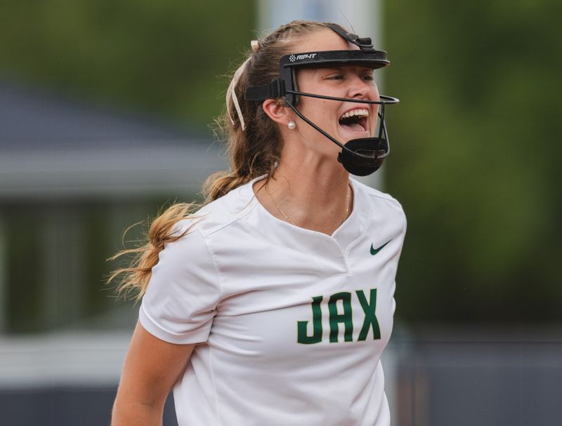 Jacksonville University junior pitcher Jacy Harrelson shouts after getting an out during the Dolphins' ASUN Tournament game against the University of North Florida on May 8, at the UNF Softball Complex. JU won 9-2 to advance in the ASUN Tournament.