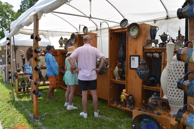 Scenes from the 54th Mayfaire by-the-Lake art festival on Lake Morton in Lakeland, Florida, on May 9, 2026. The annual festival, drawing more than 150 artists, is organized by the Ashley Gibson Barnett Museum of Art at Florida Southern College.
