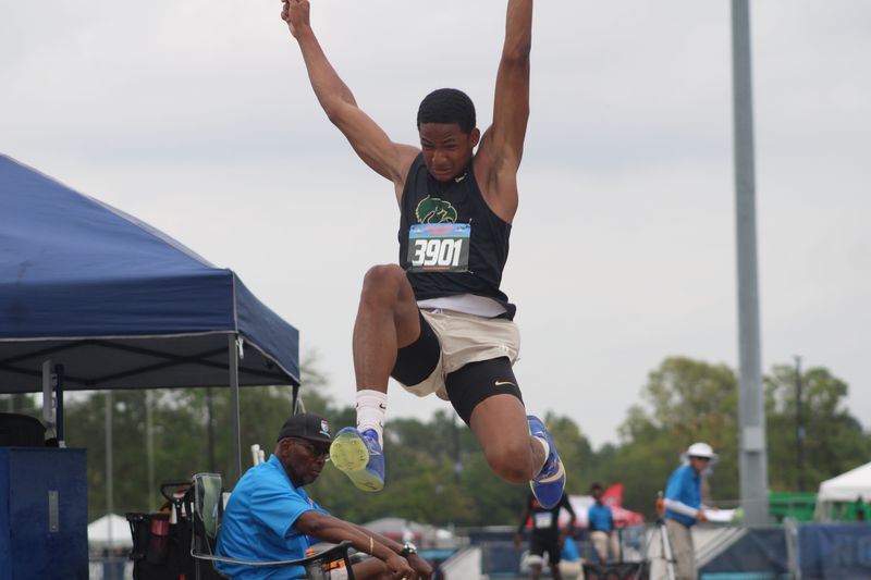 Viera's Michal Paul (3901) takes flight in the boys long jump during the FHSAA Class 4A high school track and field championships on May 9, 2026. [Clayton Freeman/Florida Times-Union]