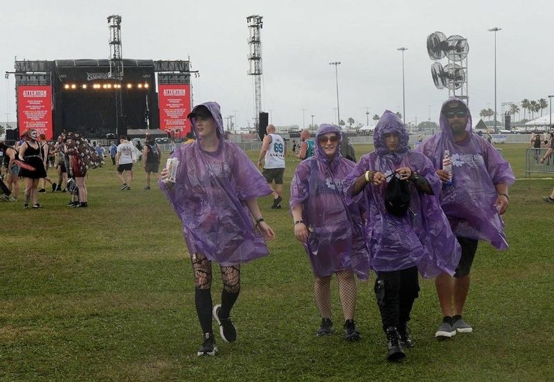 Fans begin to evacuate the infield at Daytona International Speedway on Day 3 of Welcome to Rockville as strong storms moved through the area.