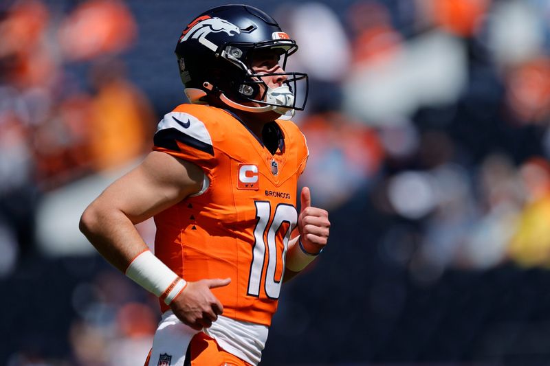 Sep 7, 2025; Denver, Colorado, USA; Denver Broncos quarterback Bo Nix (10) practices before the game at Empower Field at Mile High. Mandatory Credit: Isaiah J. Downing-Imagn Images
