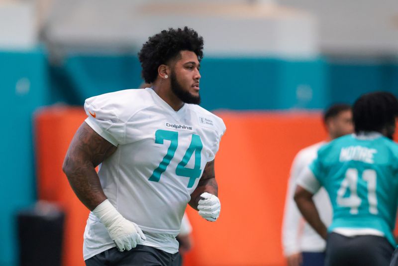 May 8, 2026; Miami Gardens, FL, USA; Miami Dolphins guard Kadyn Proctor (74) works during rookie minicamp at Baptist Health Training Complex. Mandatory Credit: Sam Navarro-Imagn Images