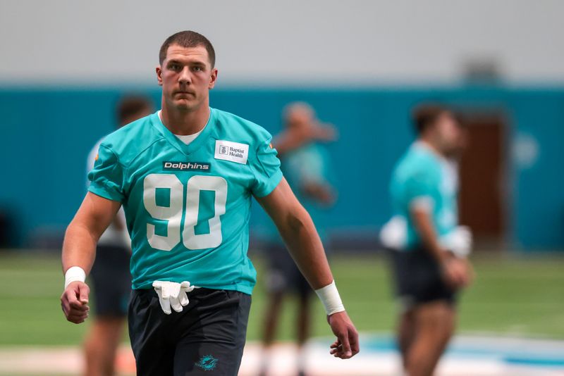 May 8, 2026; Miami Gardens, FL, USA; Miami Dolphins edge Mason Reiger (90) works during rookie minicamp at Baptist Health Training Complex. Mandatory Credit: Sam Navarro-Imagn Images