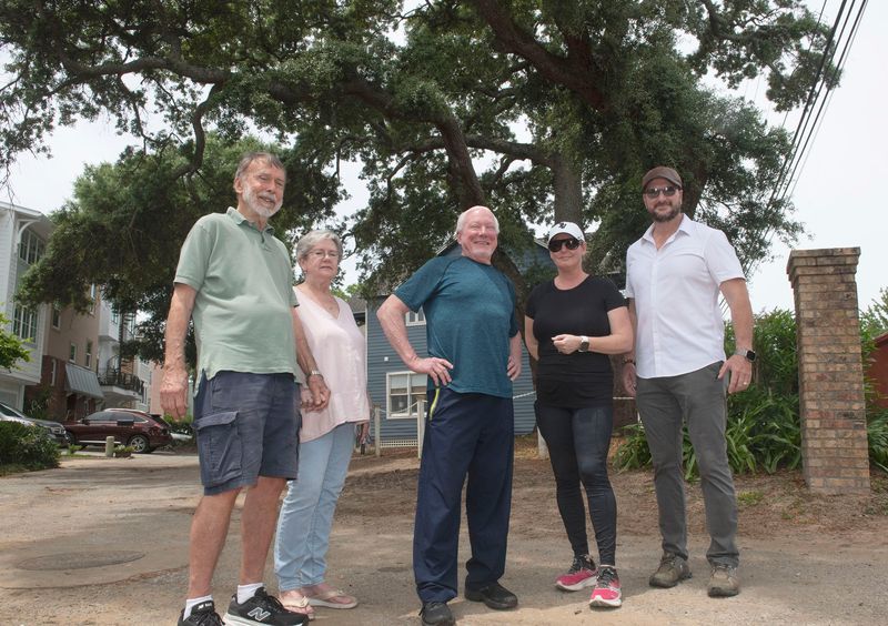 Seville district residents Rod and Sandy Magie, Charles Spatch, and Lina and Kevin Stevens are leading the fight to save a heritage oak from being destroyed to make way for a new home at the Eastern end of Government Street in downtown Pensacola.