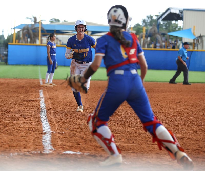 John Carroll Catholic's Samantha Rychter in a softball Region 4-2A semifinal against Cardinal Newman on May 12, 2026, in Fort Pierce. The game was postponed due to the severe storms moving through the area.