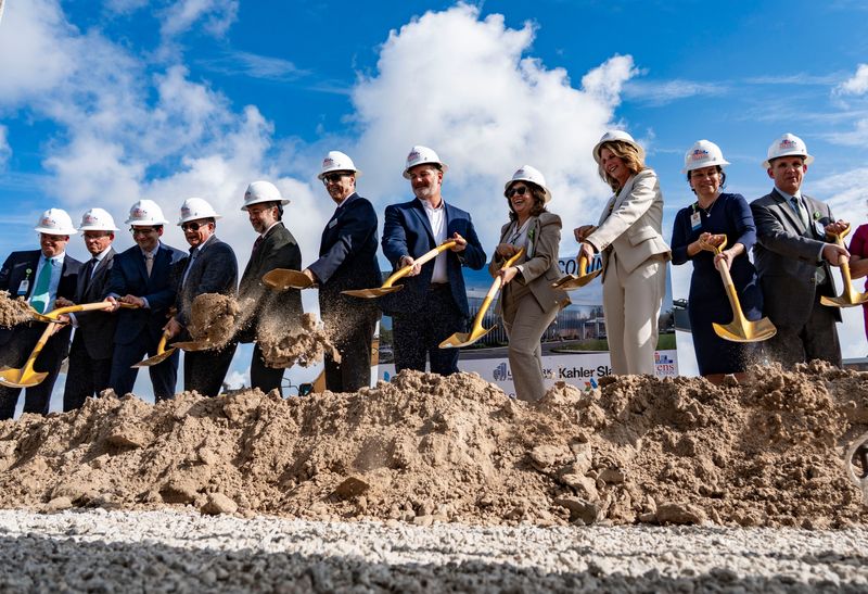 Attendees including leadership from Lee Health, Landmark Healthcare Facilities and Stevens Construction take part in a groundbreaking ceremony for a 60,000-square-foot pediatric outpatient surgery center operated by Lee Health near Golisano Children's Hospital in Fort Myers, Fla., on Wednesday, May 13, 2026.