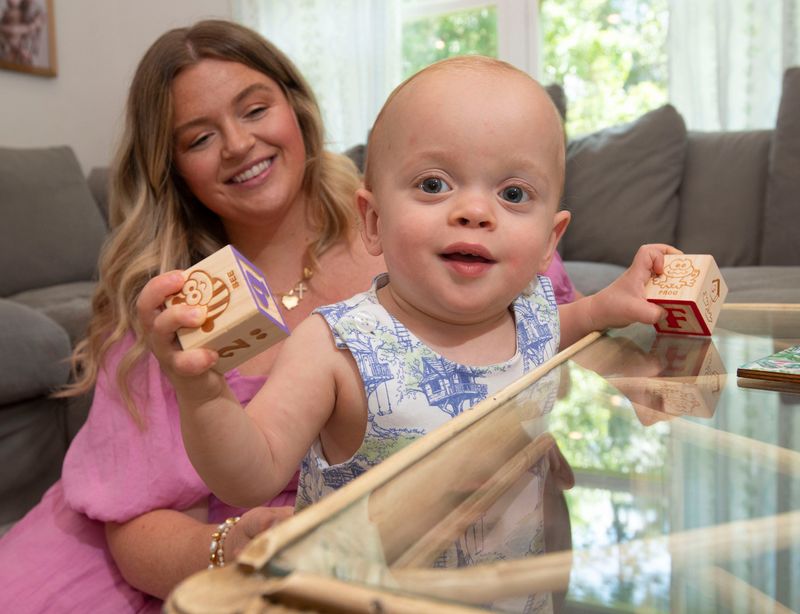 Milton area resident Madison Setlitt enjoys some playtime with her 15-month-old son, Chase, in the family home on May 13, 2026. Madison delivered Chase after learning she had a severe form of Preeclampsia.