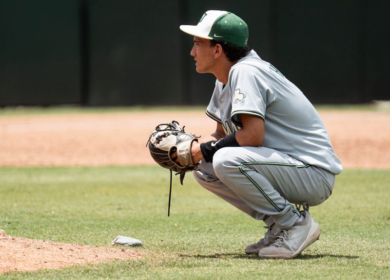 MJ Hough, a pitcher for the St. John Neumann High School baseball waits for play to start during the 2026 FHSAA Baseball State Championships semifinal games against Orangewood Christian at Hammond Stadium in Fort Myers on Thursday, May 14, 2026. St. John Neumann lost 6-4.