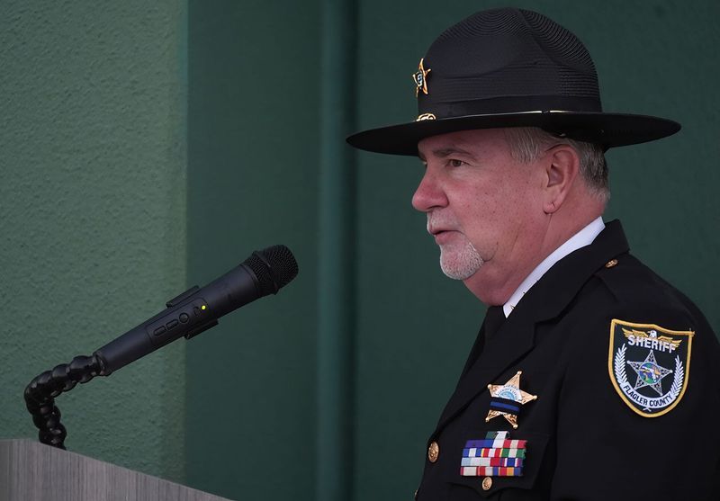 Sheriff Rick Staly speaks to the crowd during the memorial service to honor fallen officers at the Flagler County Sheriff's Office Operations Center in Bunnell, May 14, 2026.