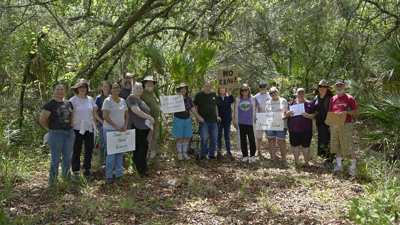Opponents to the Embry-Riddle Aeronautical training airstrip proposed for use in the Ocala National Forest gather on May 9, 2026.