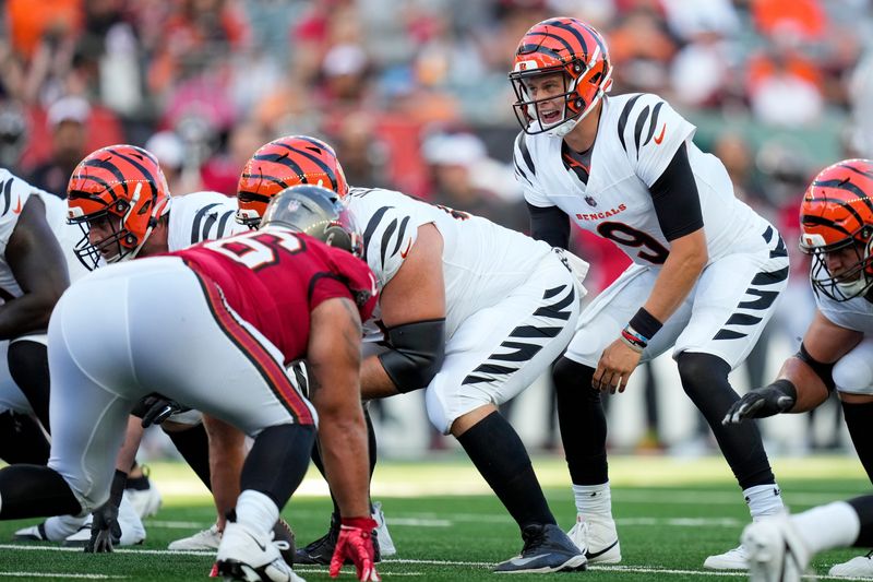 Cincinnati Bengals quarterback Joe Burrow (9) calls out in the first quarter of the NFL Preseason Week 1 game between the Cincinnati Bengals and the Tampa Bay Buccaneers at Paycor Stadium in downtown Cincinnati on Saturday, Aug. 10, 2024.