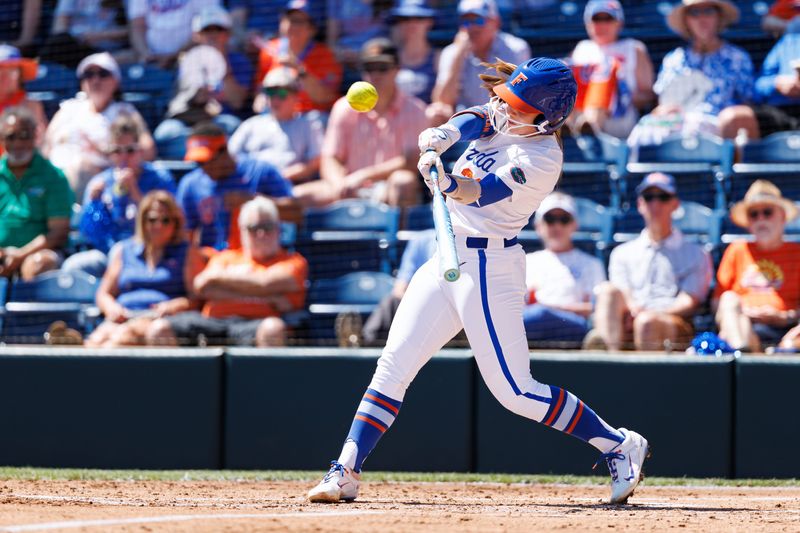 May 15, 2026; Gainesville, FL, USA; Florida Gators infielder Kenleigh Cahalan (31) hits the ball for an RBI against the Florida A&M Rattlers during the first inning at Katie Seashole Pressly Stadium. Mandatory Credit: Matt Pendleton-Imagn Images