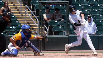 Zac Brown of Buchholz connects for the game-winning sacrifice fly to center field to score the winning run against Martin County in the Class 6A State Semifinal on Friday at Lee Health Sports Complex - Hammond Stadium in Fort Myers. Buchholz defeated the Tigers, 3-2.