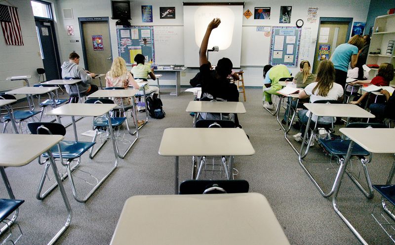 Gainesville, Fla.-101105--Students can be seen working in this half-empty classroom at Oak View Middle School on Tuesday, October 11, 2005. This particular math class is smaller than usual but still has less than it's normal 21 students