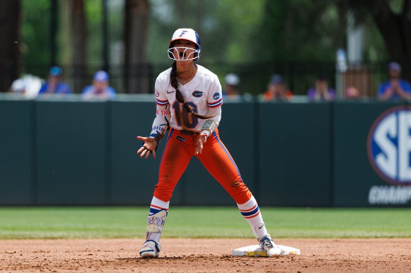 May 17, 2026; Gainesville, FL, USA; Florida Gators infielder Gabi Comia (10) reacts after sliding into second base against the Georgia Tech Yellow Jackets during the second inning at Katie Seashole Pressly Stadium. Mandatory Credit: Matt Pendleton-Imagn Images