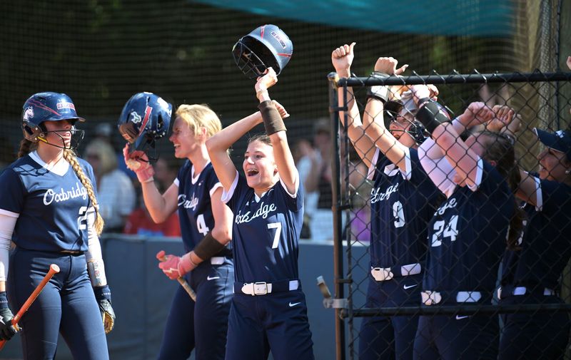 Oxbridge Academy's Hailey Goode (7) and her Thunderwolves teammates celebrate a run scored during a district title game against King's Academy on April 30, 2026.