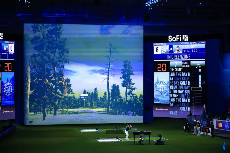 Jan 7, 2025; Palm Beach Gardens, Florida. Rickie Fowler of New York Golf Club plays a shot on the seventh hole during their TGL presented by SoFi match against The Bay Golf Club at SoFi Center. Mandatory Credit: Handout Photo/ Mike Ehrmann/TGL Golf via Image Images
